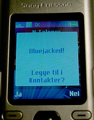 Mobile screen displaying 'Bluejacked! Legge til i Kontakter?' with options 'Ja' and 'Nei'.